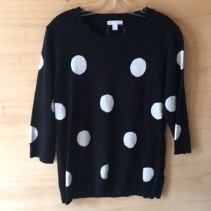 Black sweater with larger white polka dots